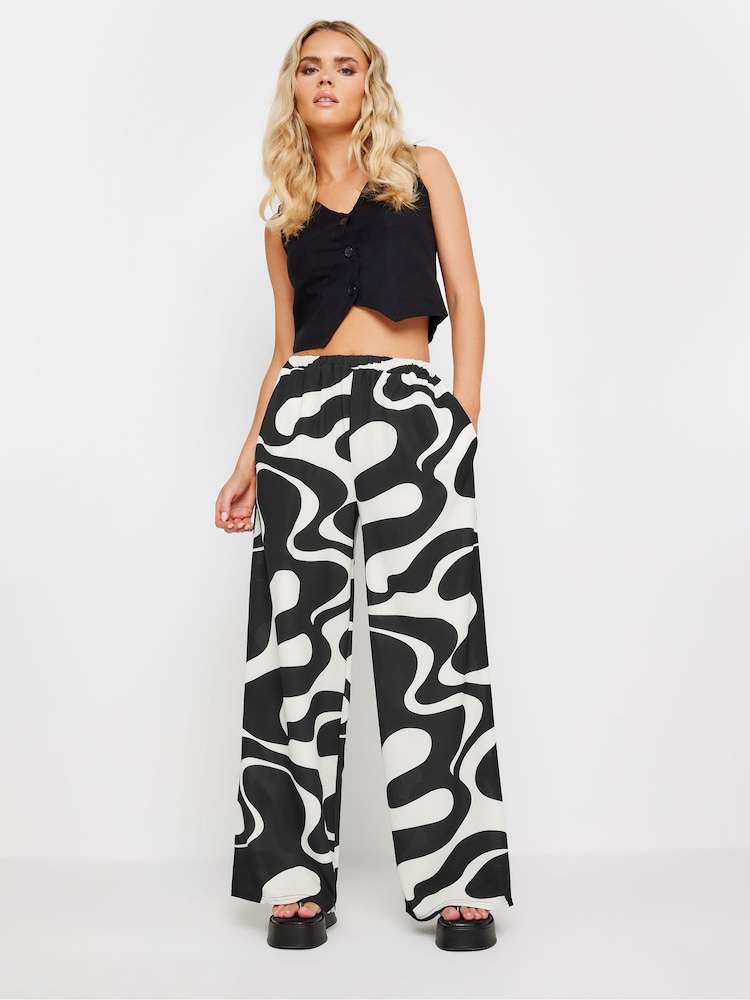 PixieGirl Petite Black Abstract Swirl Print Wide Leg Trousers - Image 1 of 5