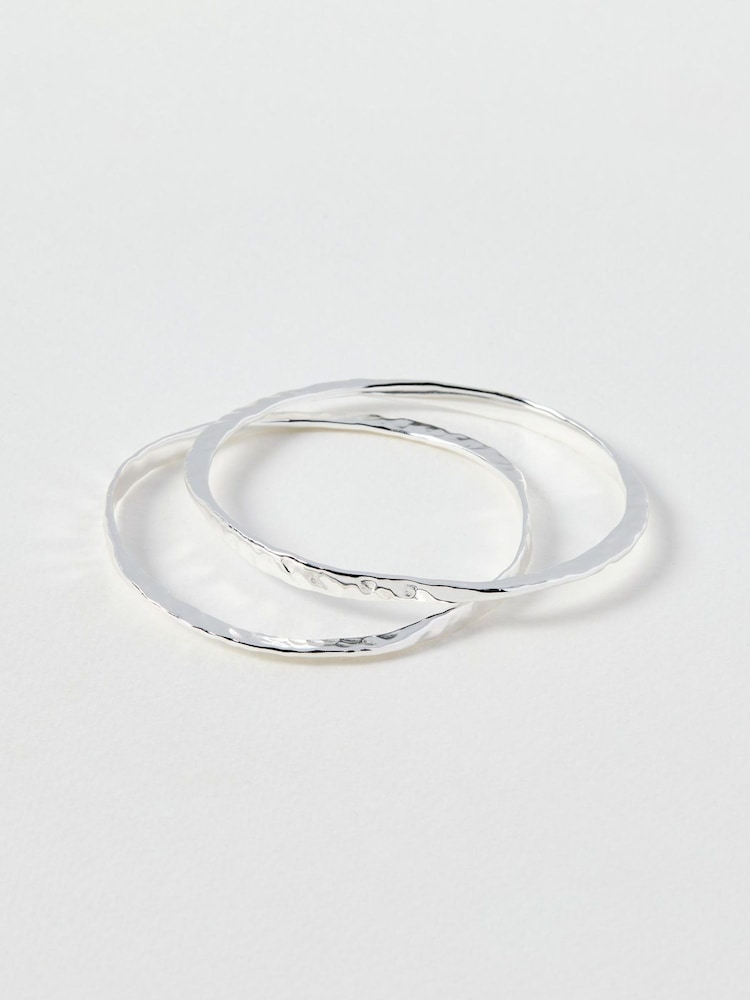 Oliver Bonas Silver Clara Oval Hammered Silver Plated Bangles Set of 2 - Image 1 of 4 Oliver Bonas Silver Clara Oval Hammered Silver Plated Bangles Set of 2 - Image 1 of 4
