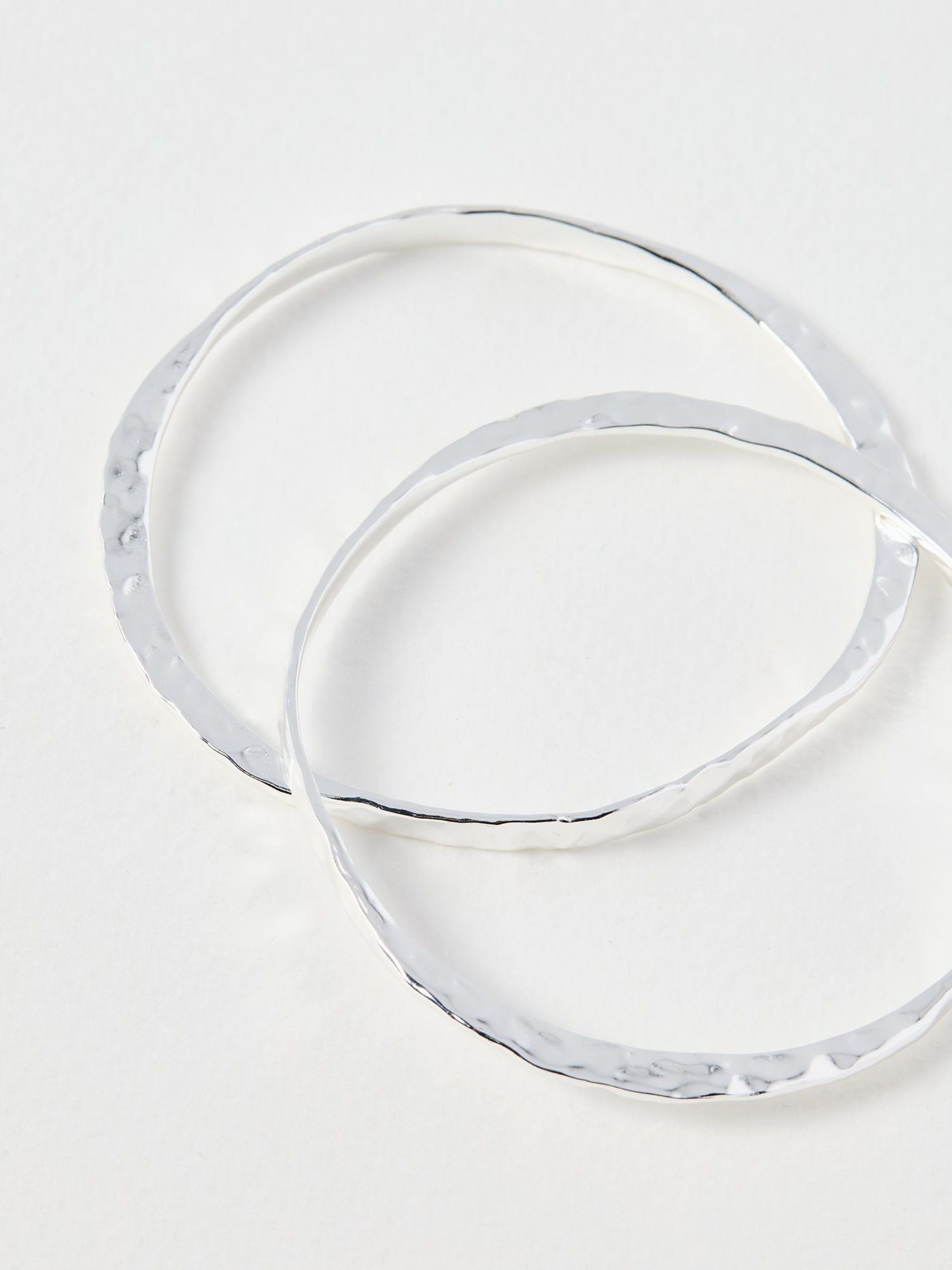 Buy Oliver Bonas Silver Clara Oval Hammered Silver Plated Bangles
