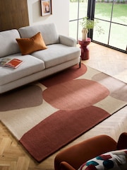 Rust Brown Pebbled Shapes Rug - Image 1 of 4
