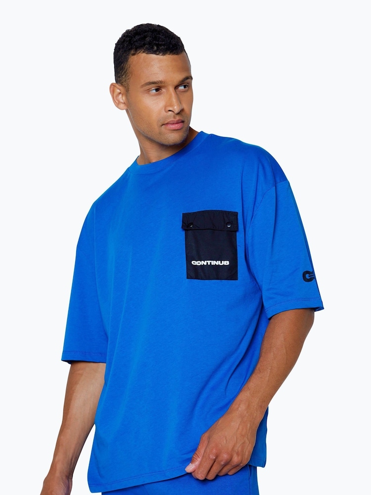 Hype. Blue CONTINU8 Unisex Cargo Pocket Boxy T-Shirt - Imagen 1 de 4