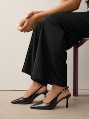 Black Forever Comfort® Point Toe Sling Back Heels - Image 1 of 7