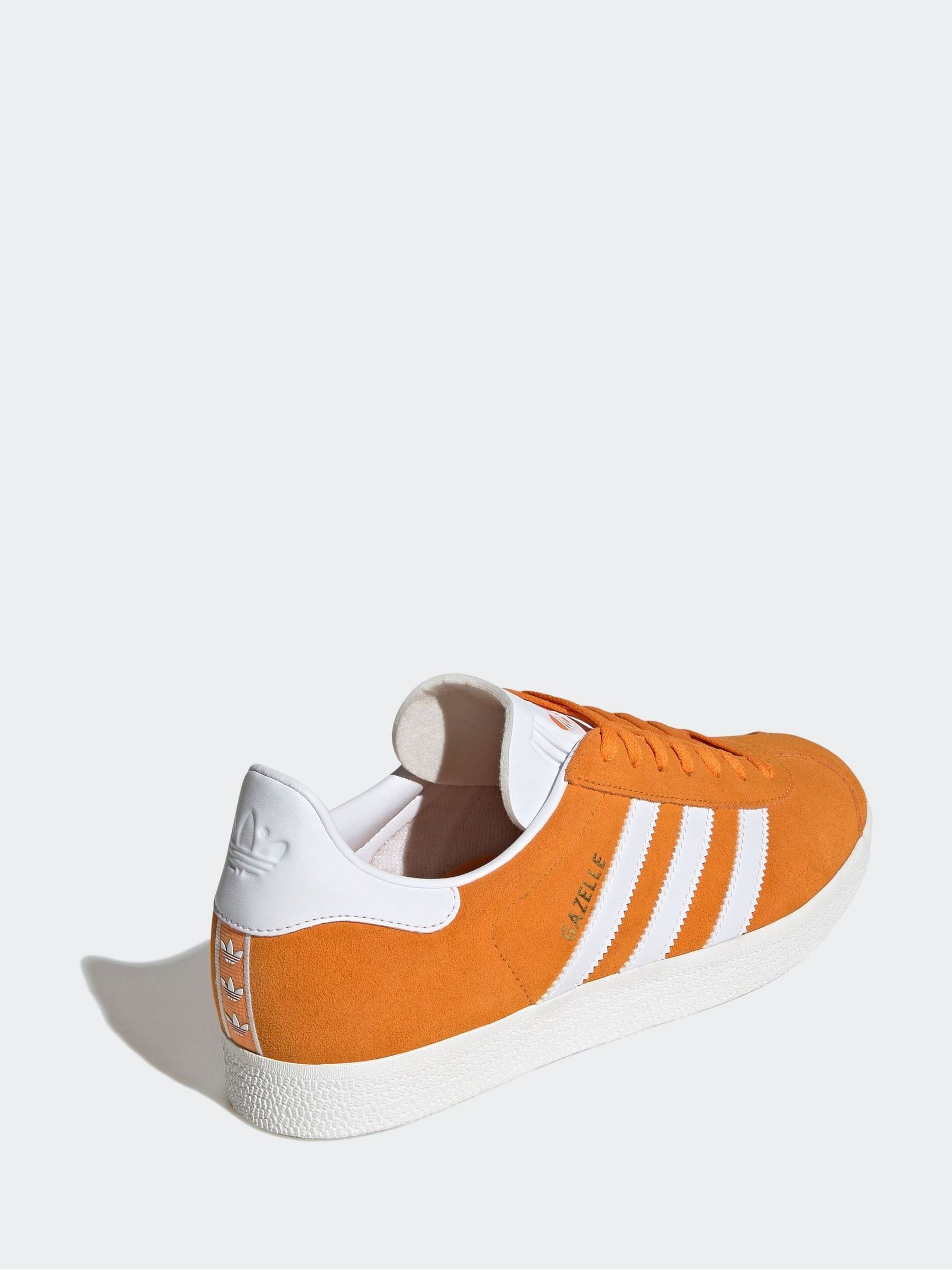 Orange suede adidas sales