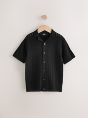 Black Button Through Short Sleeve Knitted Polo Shirt (3-16yrs) - Image 1 of 7