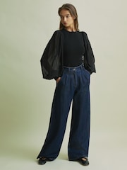 Florere Hybrid Knit Sheer Sleeve Black Top - Image 1 of 6