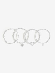Pack de 4 pulseras elásticas con colgante de bola corazón pulido en tonos de Mood - Imagen 1 de 3
