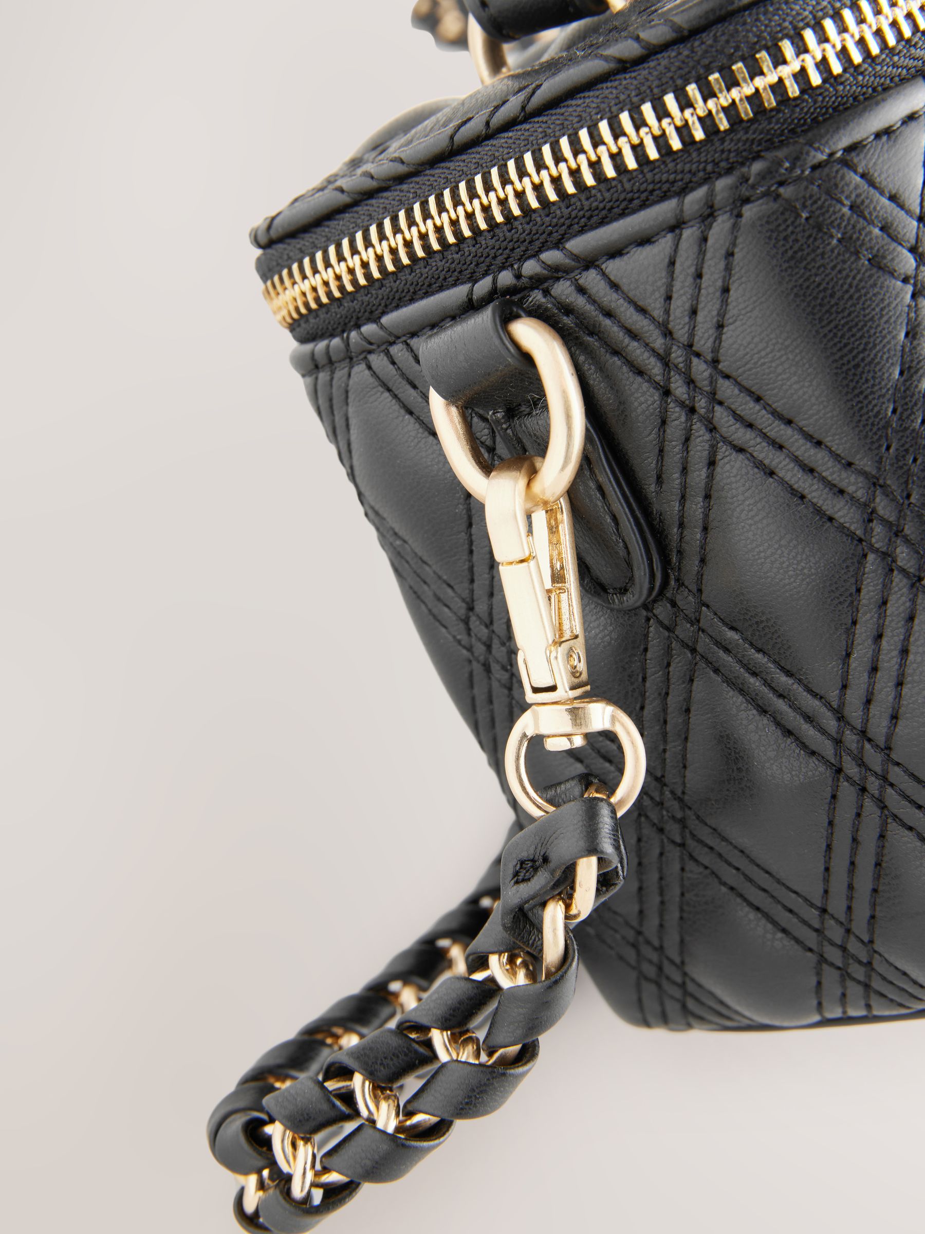 Buy Black Quilted Cross-Body Bag from Next Canada
