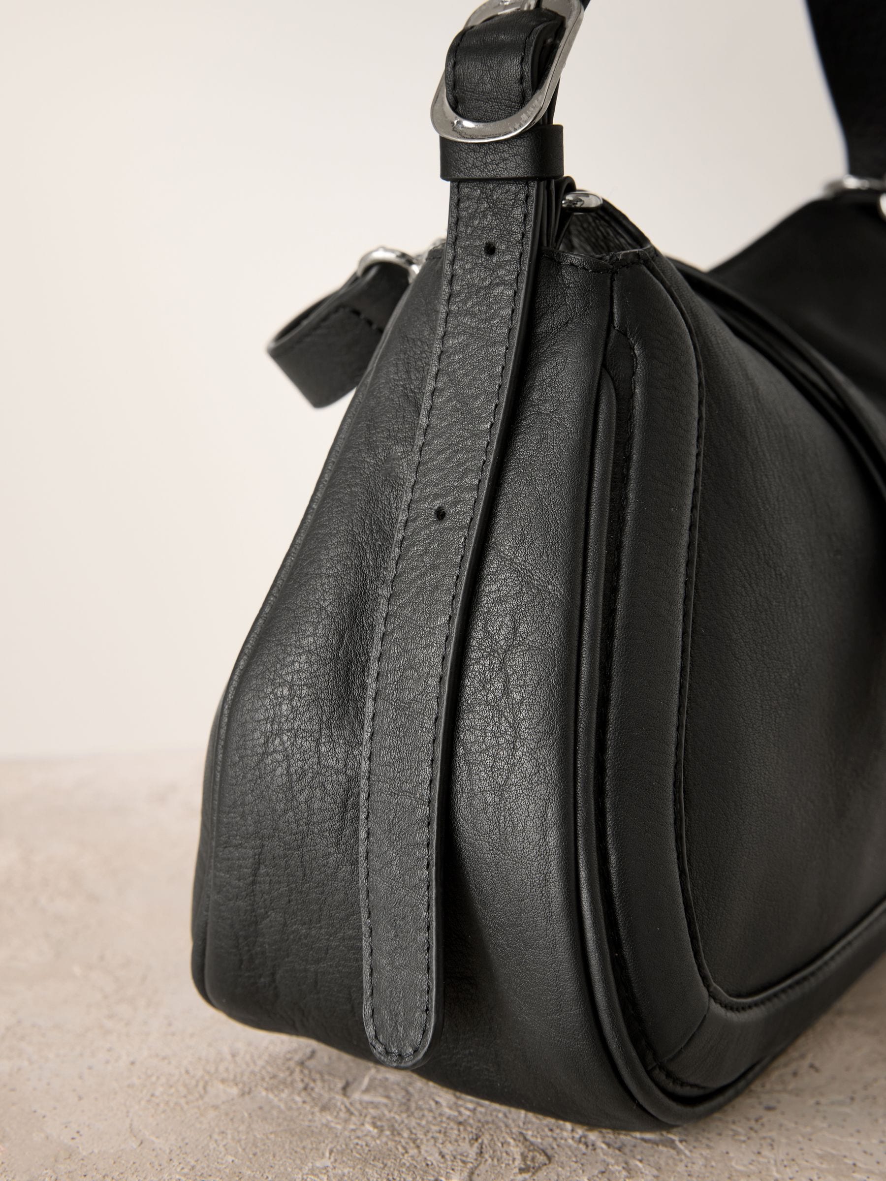 Buy Black Leather Curve Cross-Body Bag from the Next UK online shop