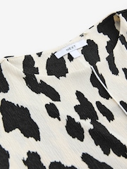 Cow Print Flutter Sleeve Textured Smart Top - Image 8 of 8
