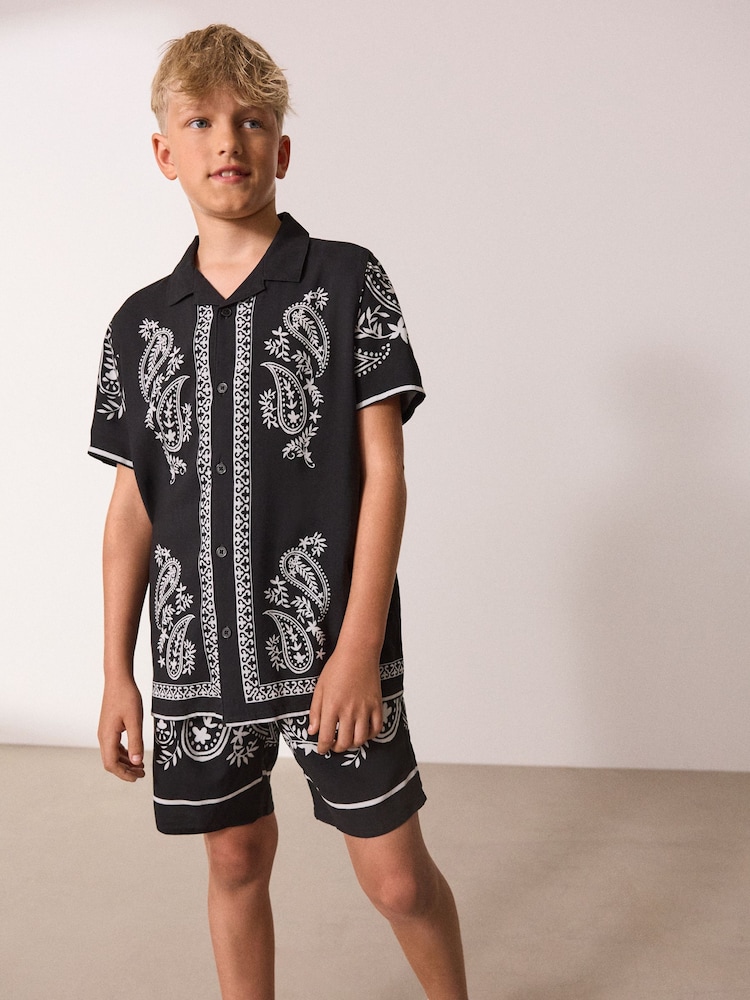 Black/White Short Sleeve Boarder Printed Shirt and Shorts Set (3-16yrs) - Image 1 of 4