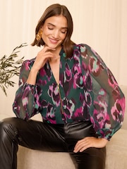 Love & Roses Green Animal Zip Front Mix Sheer Long Sleeve Blouse - Image 1 of 4