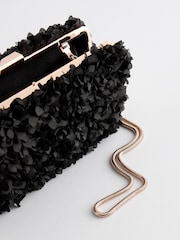 Schwarz - Hartschalen-Clutch mit Corsage - Bild 7 von 9