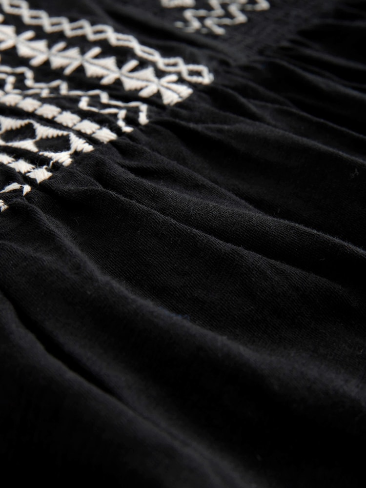 Black/White Embroidered Strappy 100% Cotton Mini Dress - Image 8 of 8 Black/White Embroidered Strappy 100% Cotton Mini Dress - Image 8 of 8