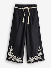 Another Sunday 3/4 Length Wide Leg Embroidered 100% Cotton Black Trousers With Ecru Belt - Image 1 of 1