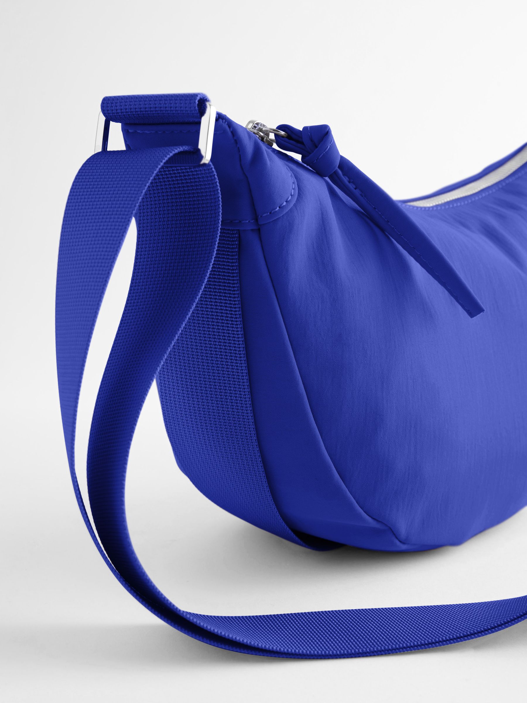 Buy Blue Sling Cross Body Bag from Next Luxembourg