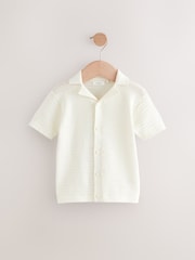 White Textured Revere Collar Short Sleeve Knitted 100% Cotton Polo Shirt (3mths-7yrs) - Image 1 of 4