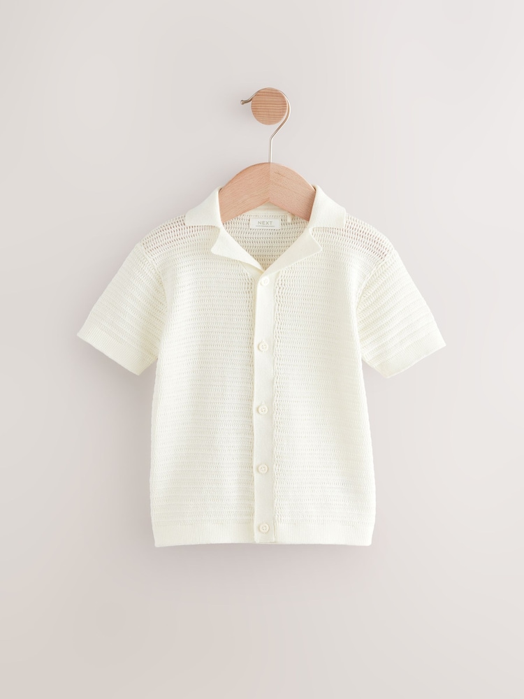 White Textured Revere Collar Short Sleeve Knitted 100% Cotton Polo Shirt (3mths-7yrs) - Image 1 of 4