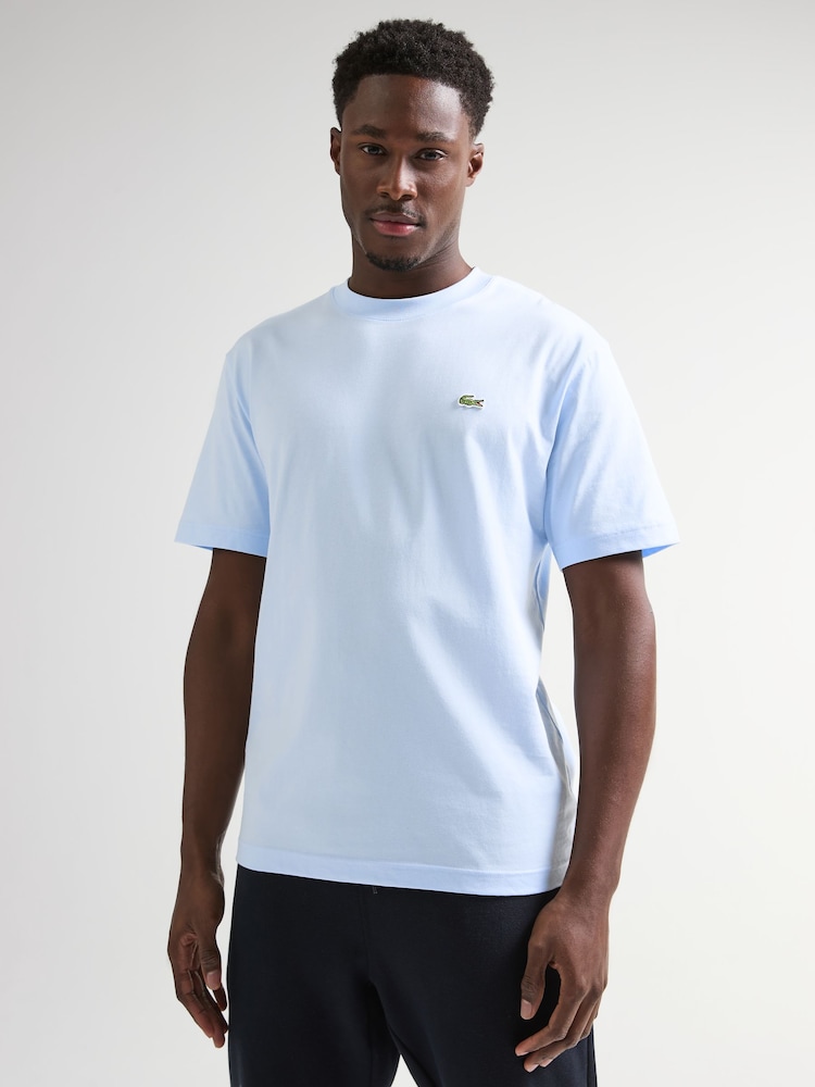 Голубой - Трикотажная футболка свободного кроя из 100% хлопка Lacoste - Изображение 1 из 5