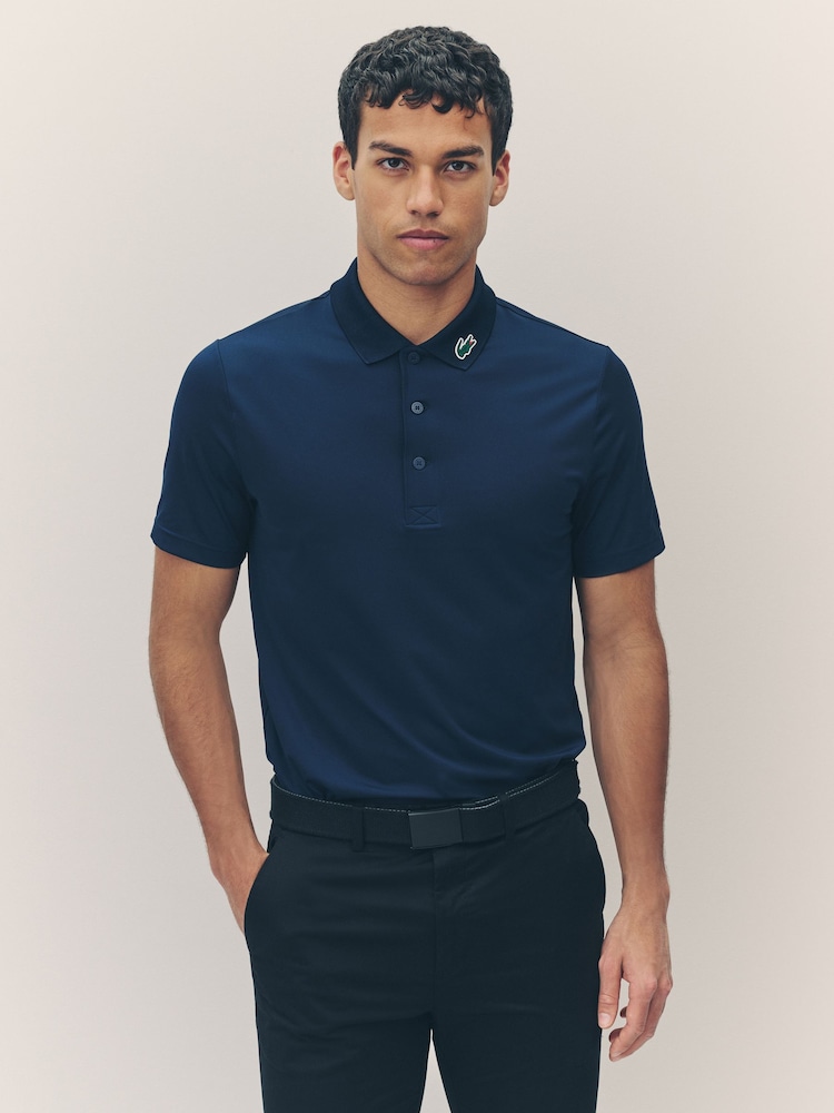 Blau - Lacoste Golf-Poloshirt mit UV-Schutz in normaler Passform - Bild 1 von 6 Blau - Lacoste Golf-Poloshirt mit UV-Schutz in normaler Passform - Bild 1 von 6