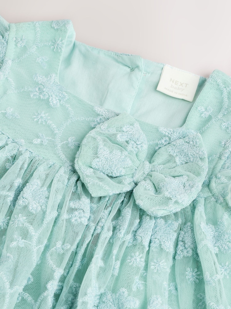Sage Green Broderie Mesh Bow Baby Dress (0mths-2yrs) - Image 3 of 6
