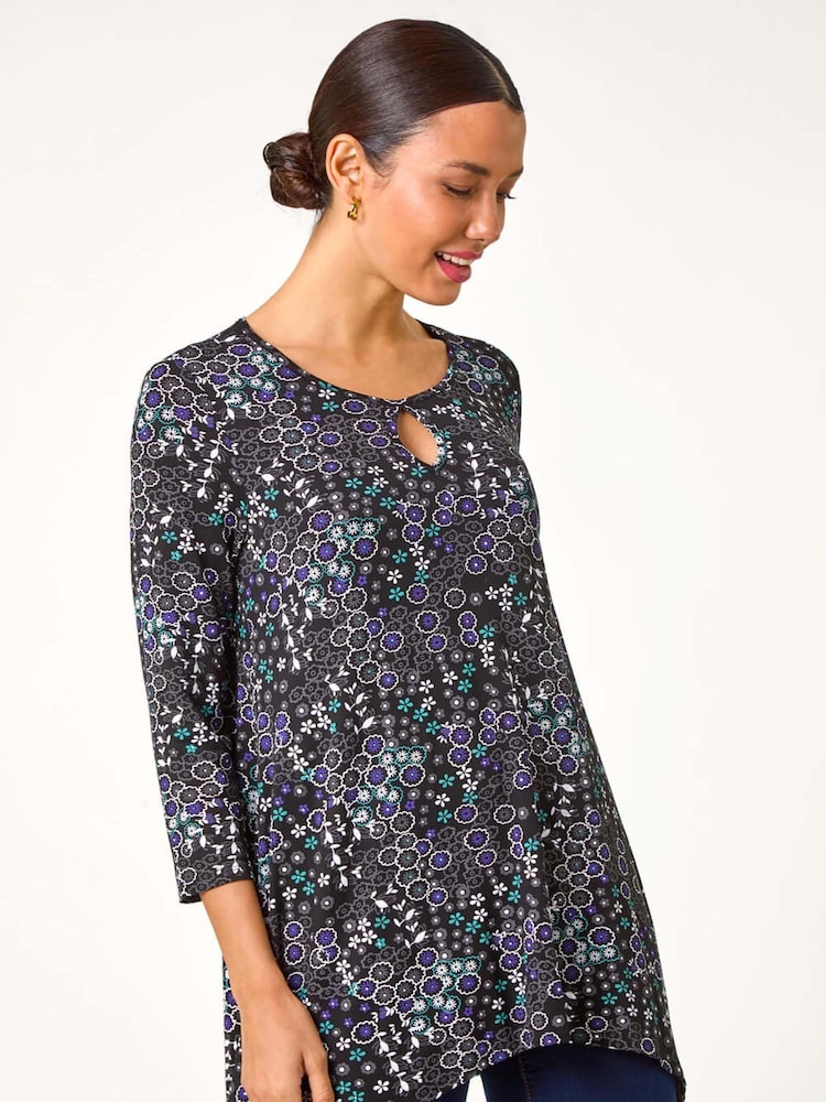 Roman Blue Abstract Circle Print Cutout Tunic Top - Image 1 of 5 Roman Blue Abstract Circle Print Cutout Tunic Top - Image 1 of 5