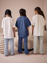 أزرق/أزرق داكن - مجموعة من 3 بيجامات ببنطلونات رياضية (3-16 سنة) - صورة 3 من 15