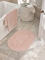 Shabby Chic by Rachel Ashwell® Soft Pink Oval Crochet 100% Cotton Bath Mat - Image 1 of 3
