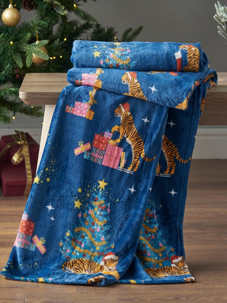 Catherine Lansfield Navy Blue Christmas Tiger Print Soft and Cosy Fleece Throw - Image 1 of 4