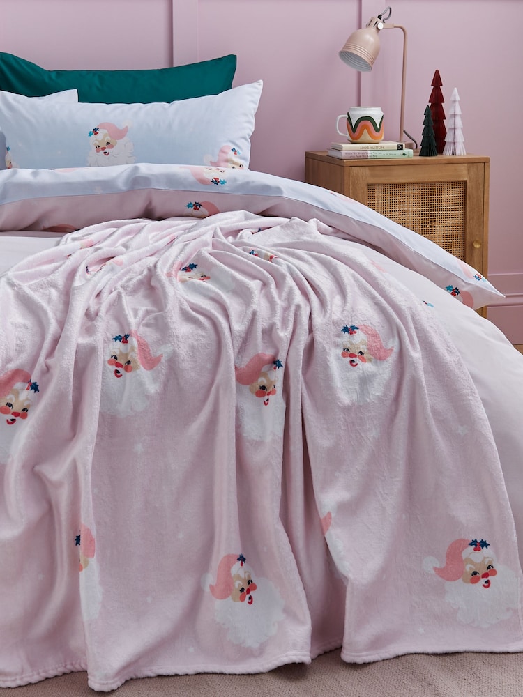 Catherine Lansfield Pink Vintage Christmas Santa Soft and Cosy Fleece Throw - Image 1 of 4