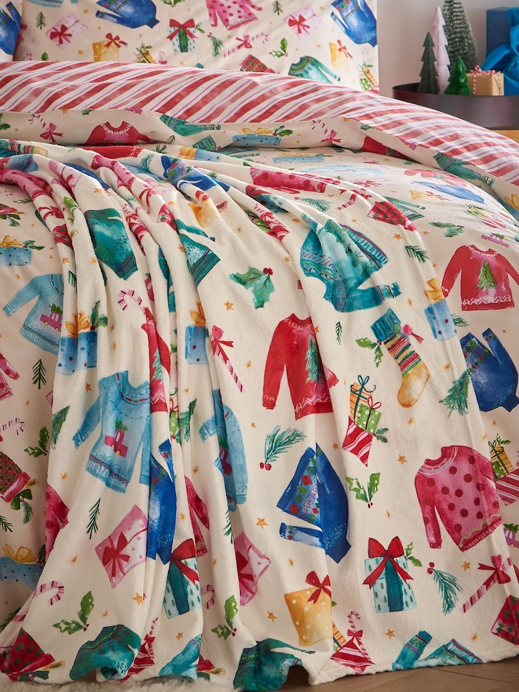 Catherine Lansfield Cream Christmas Jolly Jumpers Soft and Cosy Fleece Throw - Image 1 of 2