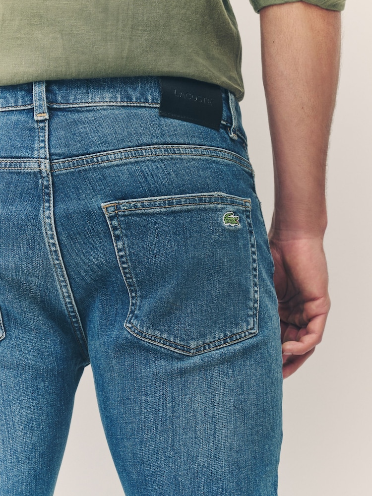 Buy Lacoste Blue Slim Cut Pocket Indigo Jeans from the Next UK