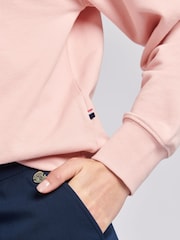 من U.S. Polo Assn. سويت شيرت نسائي كبير وردي بتصميم خيّال مزدوج - صورة 5 من 7