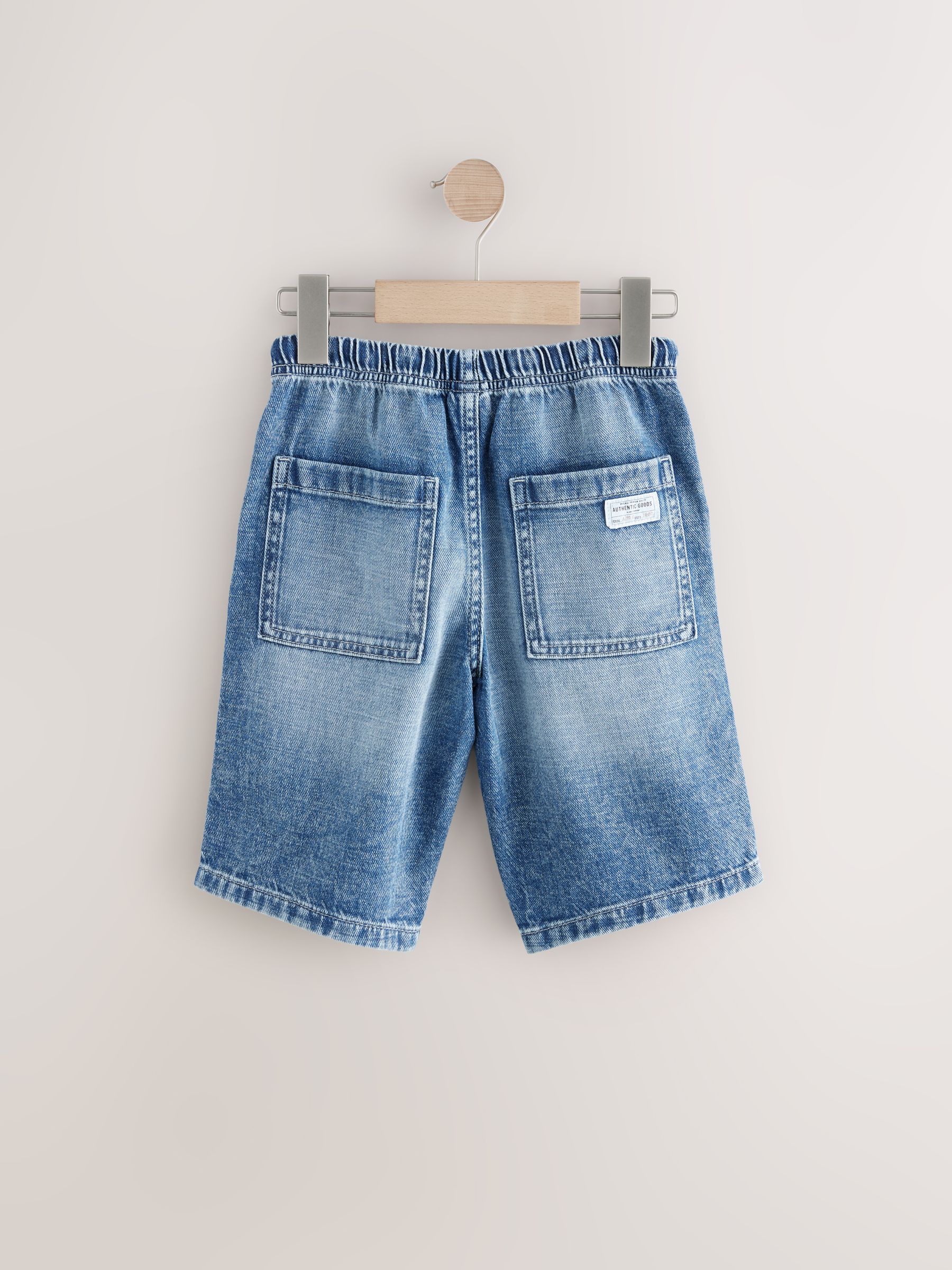 Buy Mid Blue Denim Bermuda Pull On Shorts (3-16yrs) from the Next