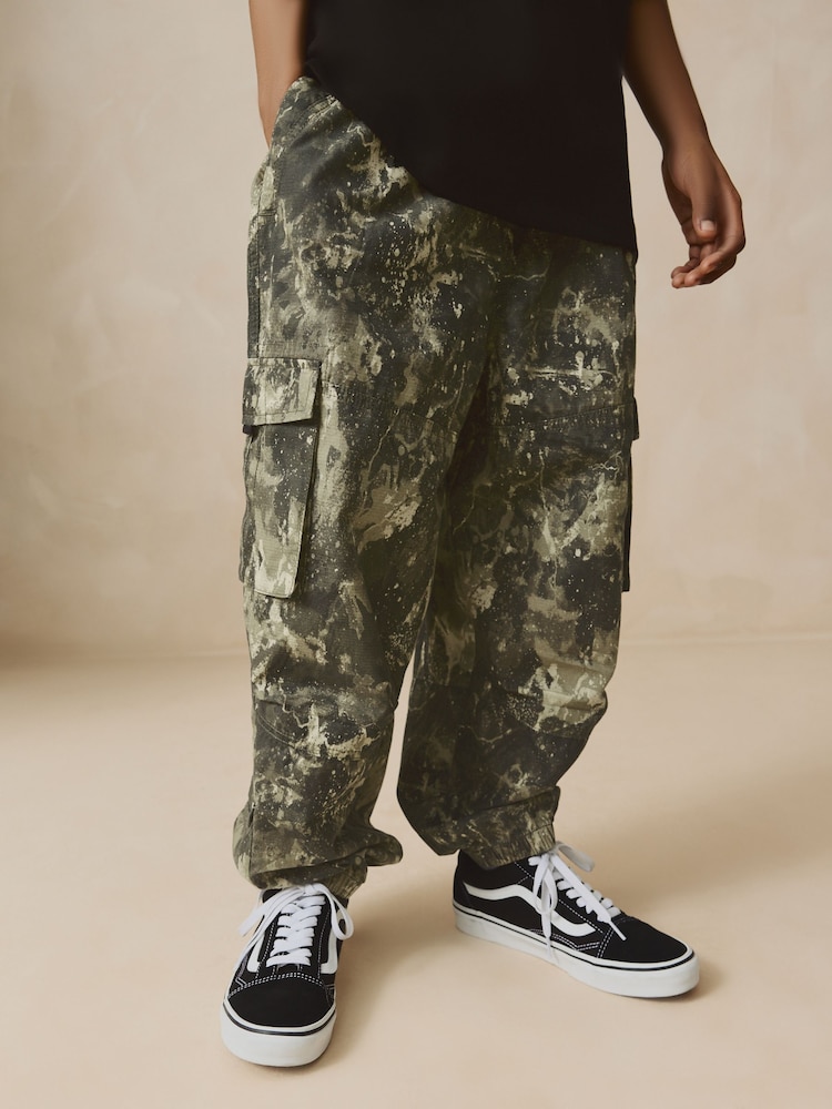 Khaki Camo 100% Cotton Wide Tapered Cargo Trousers (3-16yrs) - Image 1 of 8 Khaki Camo 100% Cotton Wide Tapered Cargo Trousers (3-16yrs) - Image 1 of 8