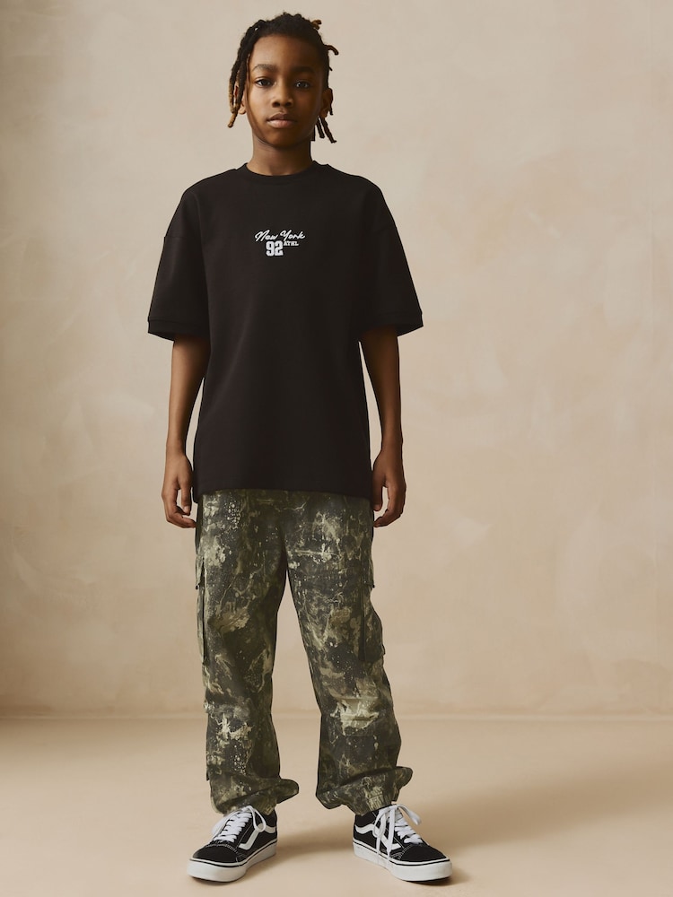 Khaki Camo 100% Cotton Wide Tapered Cargo Trousers (3-16yrs) - Image 2 of 8 Khaki Camo 100% Cotton Wide Tapered Cargo Trousers (3-16yrs) - Image 2 of 8