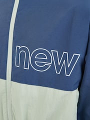 Azul claro - New Balance Kids Athletics Mesh Lined Wind Cheater Jacket - Imagen 12 de 13