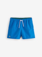 Синий - Черно-белые пляжные шорты из быстросохнуть Lacoste - Изображение 1 из 9