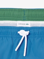 Синий - Черно-белые пляжные шорты из быстросохнуть Lacoste - Изображение 8 из 9