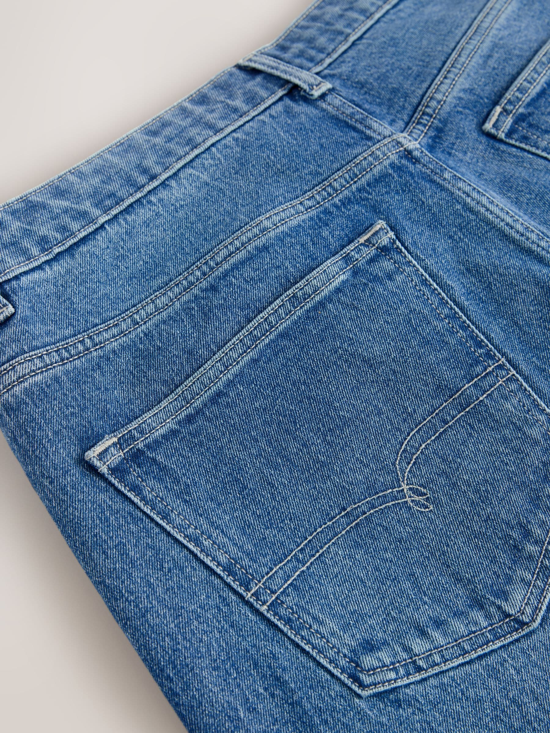 Buy Blue Mid Tint Straight Fit Vintage Wash Denim Jeans from Next USA