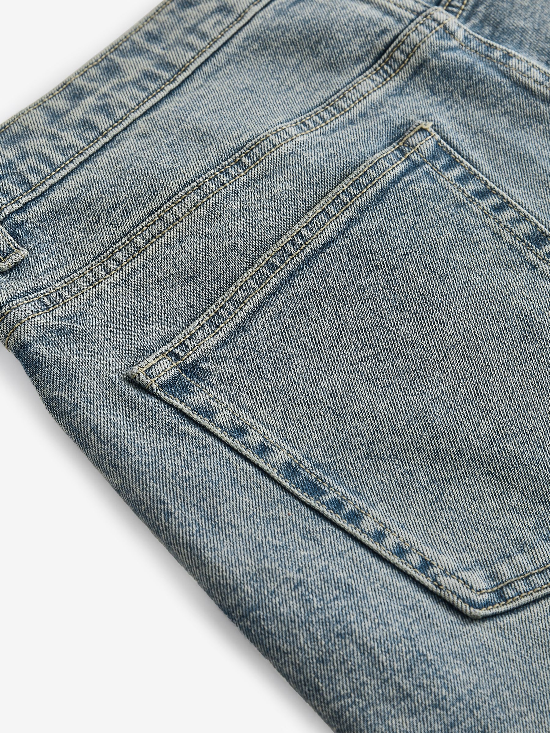 Buy Blue Light Tint Slim Fit Vintage Wash Denim Jeans from Buy Blue Light Tint Slim Fit Vintage Wash Denim Jeans from