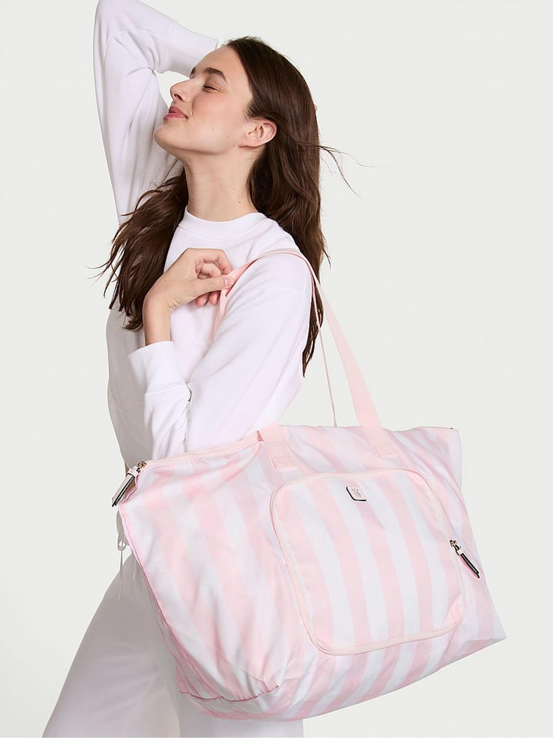 Buy Victoria s Secret Pink Iconic Stripe Foldable Weekender Tote Bag from the Next UK online shop