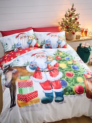 Catherine Lansfield Red Christmas Retro Santa Reversible Duvet Cover Set - Image 1 of 4