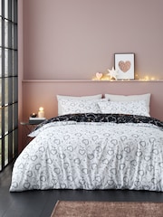 Catherine Lansfield Black and White Cosmic Hearts and Stars Soft Satin Duvet Cover Set - Image 2 of 5