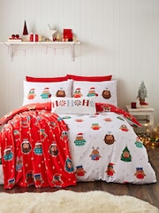 Juego de funda de edredón reversible con diseño navideño de petirrojos de Catherine Lansfield - Imagen 1 de 5