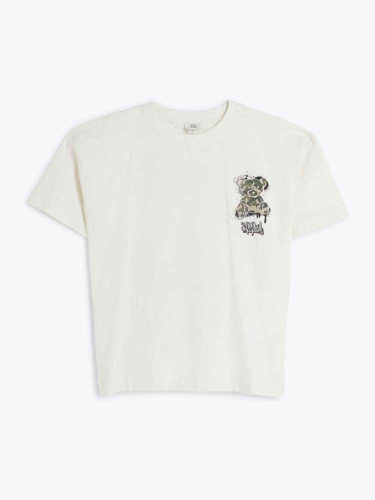 تيشِرت قطن 100% مُزيَّن بطبعة دب بنقشة مموهة للأولاد من River Island - صورة 1 من 4 تيشِرت قطن 100% مُزيَّن بطبعة دب بنقشة مموهة للأولاد من River Island - صورة 1 من 4