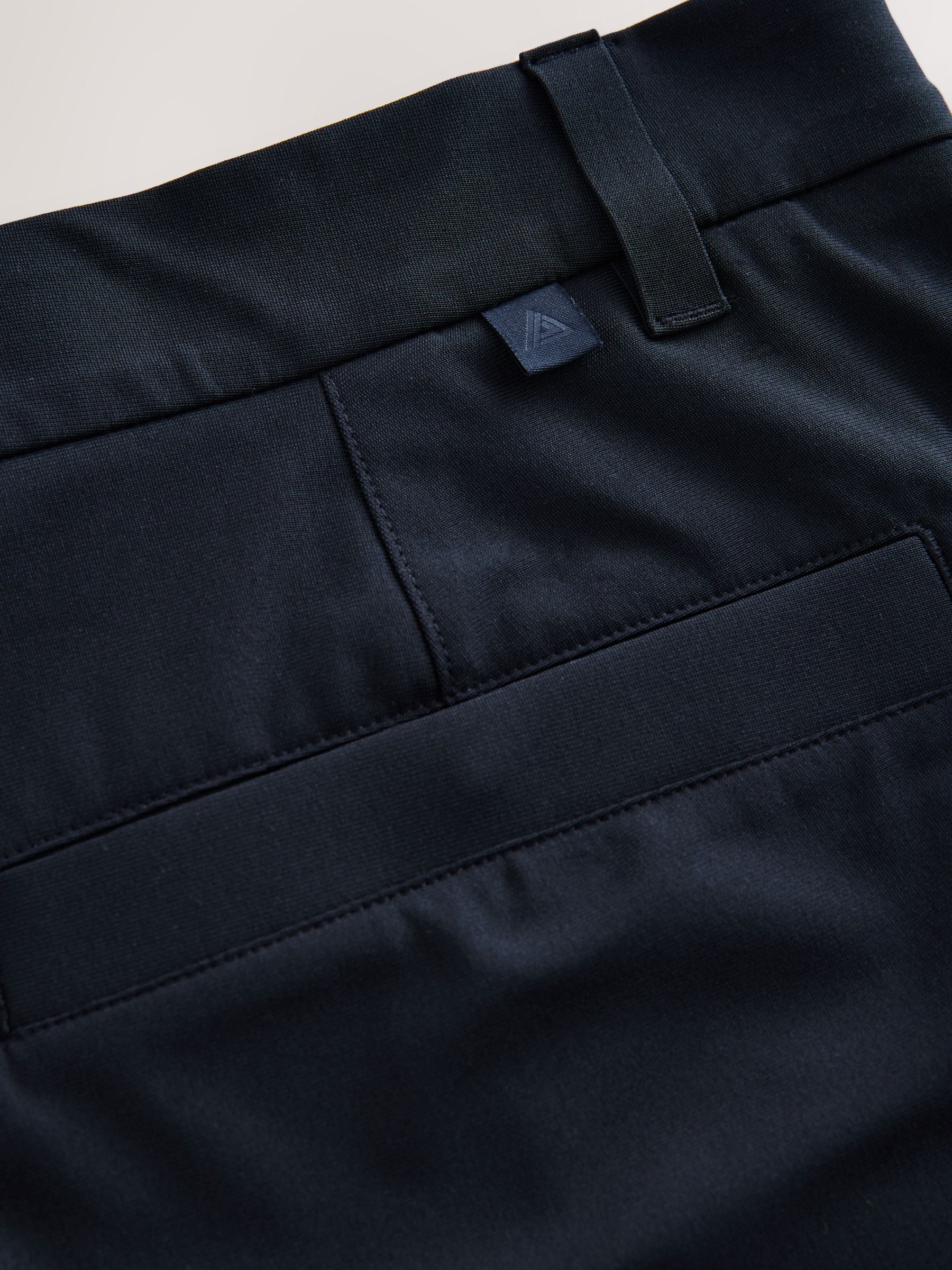 Buy Navy Blue Active Golf Chino Trousers from Next Canada
