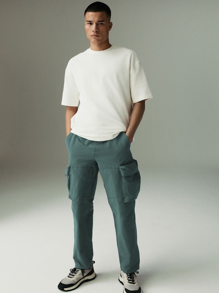Teal Blue Shower Resistant Stretch Tech Cargo Trousers - Image 2 of 9