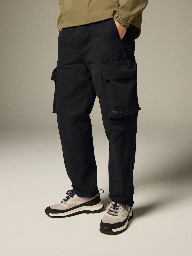 Black Shower Resistant Stretch Tech Cargo Trousers - Image 1 of 13