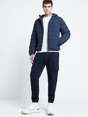 Синий - Стеганая куртка с капюшоном и пуховиком River Island - Изображение 1 из 4