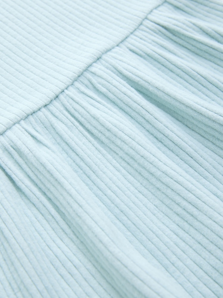Azul con estampado de florecitas - Conjunto de pantalones cortos de ciclismo y blusa de manga corta con sobrefalda (3 meses - 7 años) - Imagen 9 de 9 Azul con estampado de florecitas - Conjunto de pantalones cortos de ciclismo y blusa de manga corta con sobrefalda (3 meses - 7 años) - Imagen 9 de 9